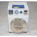 Vista lateral del Mini Autoclave alta presión para pantallas LCD con tapa de acero y soporte interior