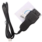 Piwis Cable Durametric para Porsche junto a portátil con software de diagnóstico