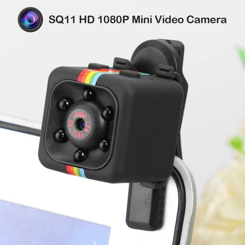 Cámara SQ11 Mini DV 1080p mostrando su tamaño compacto